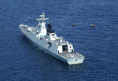 The picture taken on January 22, 2010 shows 'Maanshan' Warship convoys Chinese merchant ships in the Gulf of Aden. The frigate is on an escort mission as part of a Chinese naval flotilla.