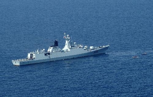 The picture taken on January 22, 2010 shows 'Maanshan' Warship convoying Chinese ships in the Gulf of Aden. The frigate is on an escort mission as part of a Chinese naval flotilla.