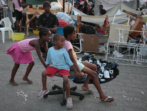 Kids play in a refugee in Port au Prince, Haiti, January 21, 2010. 