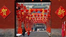 Red lanterns are hung at Ditan Park in Beijing, China, February 9, 2010.