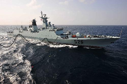 China's missile frigate 'Ma'anshan' receives supplies from Chinese 'Qiandaohu' supply ship in the Gulf of Aden, Feb. 11, 2010.