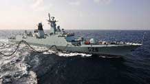 China's missile frigate 'Ma'anshan' receives supplies from Chinese 'Qiandaohu' supply ship in the Gulf of Aden, Feb. 11, 2010.