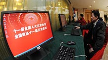 Media workers operate computers at media center for Chinese People's Political Consultative Conference (CPPCC) and National People's Congress (NPC) in Beijing, capital of China, February 26, 2010. The media center for domestic and foreign reporters has come into use on Friday.