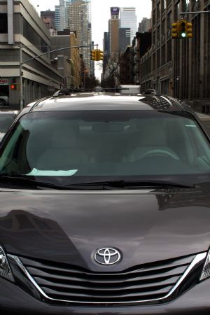 A Toyota vehicle is parked outside a Toyota showroom in New York, March 2, 2010.