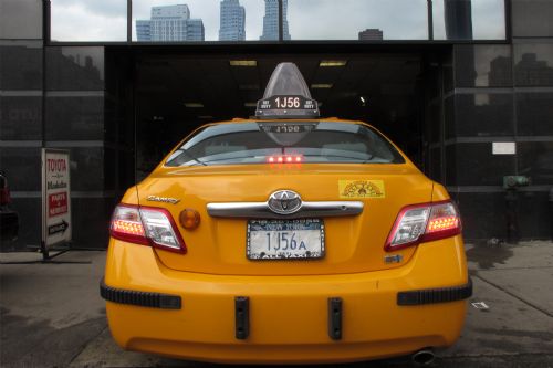 A Camry taxi is seen at a Toyota service point in New York, March 2, 2010. It was announced on Monday that Toyota has informed more than 1 million American and Japanese customers of a fault that leads to an oil leak in Toyota vehicles. 