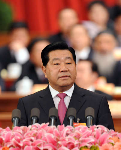 Jia Qinglin, chairman of the National Committee of the Chinese People&apos;s Political Consultative Conference (CPPCC), delivers a report on the work of the CPPCC National Committee&apos;s Standing Committee over the past year at the Great Hall of the People in Beijing, capital of China, March 3, 2010.