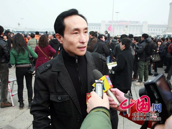 Famous Chinese comedian Gong Hanlin, a CPPCC member, attends the Opening Session of the 3rd Session of the 11th Chinese People's Political Consultative Conference, convened at 3:00 PM on March 3, 2010 at the Great Hall of the People.