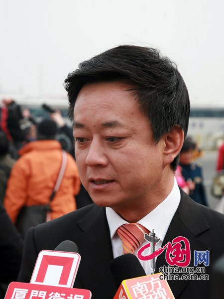 Renowned CCTV anchorperson Zhu Jun, a CPPCC member, attends the Opening Session of the 3rd Session of the 11th Chinese People's Political Consultative Conference, convened at 3:00 PM on March 3, 2010 at the Great Hall of the People.