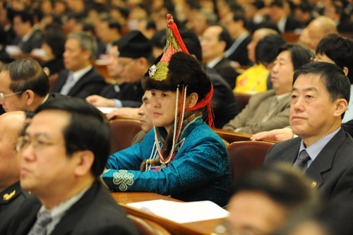 Members of the 11th National Committee of the Chinese People&apos;s Political Consultative Conference (CPPCC) attend the opening meeting of the Third Session of the 11th CPPCC National Committee at the Great Hall of the People in Beijing, capital of China, March 3, 2010.