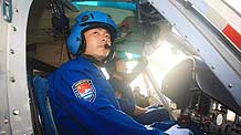 Helicopter commander Cui Ao is seen in Sanya, south China's Hainan Province, on March 4, 2010. A new Chinese naval task force set sail on Thursday morning from a military port in the south Hainan Island to replace the fourth batch of flotilla in the Gulf of Aden escorting merchant vessels.