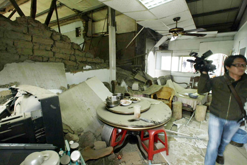 A damaged house is pictured after the earthquake in southeast China's Taiwan, March 4, 2010. 