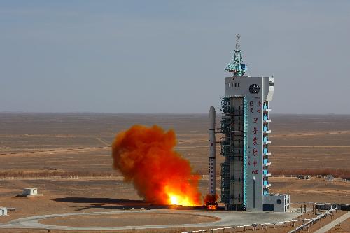 A Long March 4C carrier rocket carrying a remote-sensing satellite, 'Yaogan IX', blasts off from the Jiuquan Satellite Launch Center in northwest China's Gansu Province,March 5, 2010.
