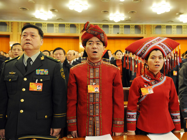 The 11th National People&apos;s Congress (NPC), the top legislature of China, starts its third session at the Great Hall of the People in Beijing at 9:00 AM Friday. NPC deputies attend the opening meeting. 