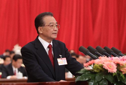 Chinese Premier Wen Jiabao delivers a government work report during the opening meeting of the Third Session of the 11th National People&apos;s Congress (NPC) at the Great Hall of the People in Beijing, capital of China, March 5, 2010.