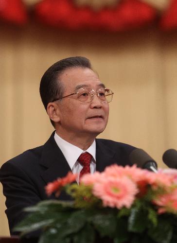 Chinese Premier Wen Jiabao delivers a government work report during the opening meeting of the Third Session of the 11th National People&apos;s Congress (NPC) at the Great Hall of the People in Beijing, capital of China, March 5, 2010. 