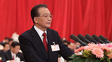 Chinese Premier Wen Jiabao delivers a government work report during the opening meeting of the Third Session of the 11th National People's Congress (NPC) at the Great Hall of the People in Beijing, capital of China, March 5, 2010.