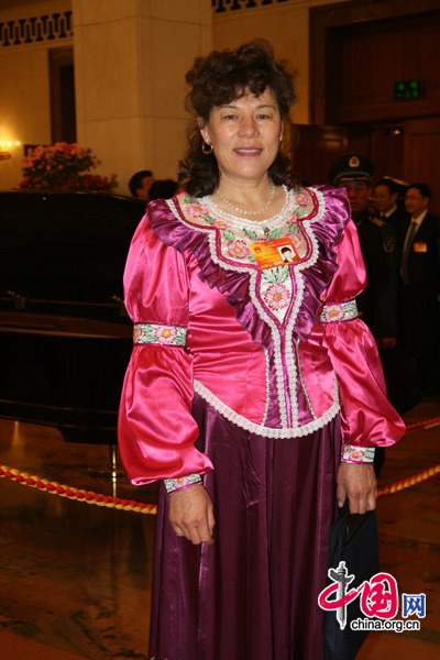 An NPC deputy from China's Russian community, one of China's 56 officially-recognized ethnic groups, attends the National People's Congress (NPC) at the Great Hall of the People in Beijing, March 5, 2010.