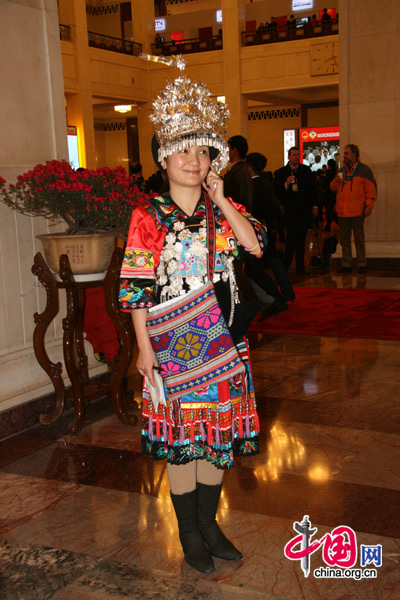 An ethnic minority deputy attends the National People's Congress at the Great Hall of the People in Beijing, March 5, 2010. 