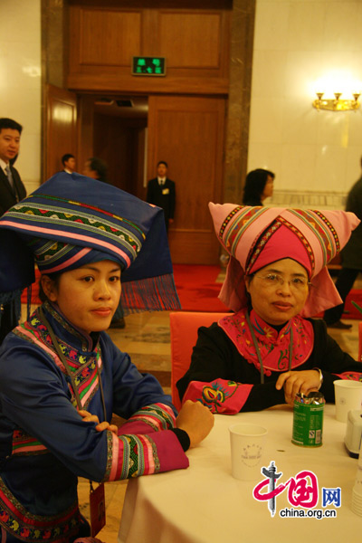 Ethnic minority deputies attend the National People&apos;s Congress (NPC) at the Great Hall of the People in Beijing, March 5, 2010.