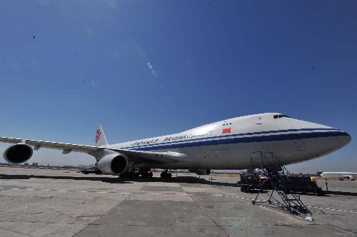 An aircraft from the Air China cargo fleet lands at the airport in Santiago, capital of Chile, March 5, 2010. A Chinese plane carrying US$2 million worth of aid goods arrived in Santiago on Friday.