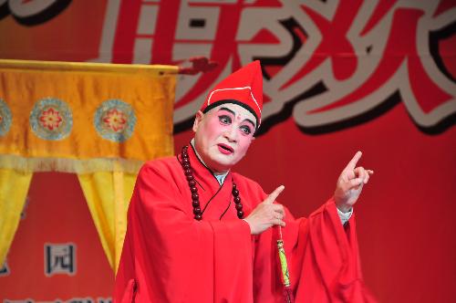 Actor Wu Guangyu from Zhejiang Provincial Wu Operal Troupe stage performance during a celebration marking the centennial anniversary of the Women&apos;s Day in Dubai, the United Arab Emirates, March 5, 2010. 