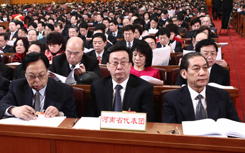 The delegation to the Third Session of the 11th National People&apos;s Congress (NPC) from central China&apos;s Henan Province attends the opening meeting of the Third Session of the 11th NPC at the Great Hall of the People in Beijing, capital of China, March 5, 2010. 