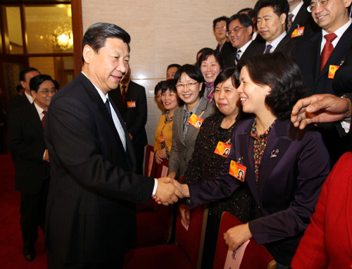 Chinese Vice President Xi Jinping (L, front), joins a panel discussion with deputies to the Third Session of the 11th National People&apos;s Congress (NPC) from east China&apos;s Zhejiang Province, in Beijing, capital of China, March 6, 2010.