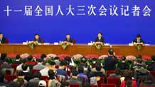 A news conference by the Third Session of the 11th National People's Congress (NPC) on guaranteeing and improving people's livelihood is held at the Great Hall of the People in Beijing, China, March 8, 2010.