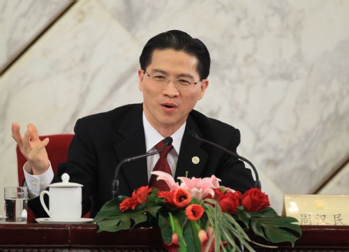 Zhou Hanmin, member of the 11th National Committee of the Chinese People's Political Consultative Conference (CPPCC), speaks during a news conference held by the Third Session of the 11th National Committee of the CPPCC on the 2010 Shanghai World Expo in Beijing, capital of China, March 8, 2010.