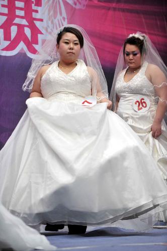 A Miss Plump beauty contest is held at a shopping mall in Shenyang, capital of northeast China's Liaoning Province, March 8, 2010.