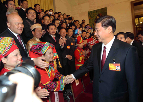 Chinese Vice President Xi Jinping (R, front), joins a panel discussion with deputies to the Third Session of the 11th National People's Congress (NPC) from south China's Guangxi Zhuang Autonomous Region in Beijing, capital of China, March 10, 2010. 