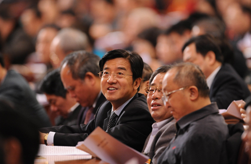 Members to the Third Session of the 11th National Committee of the Chinese People&apos;s Political Consultative Conference (CPPCC) attend the fourth plenary meeting of the Third Session of the 11th CPPCC National Committee held at the Great Hall of the People in Beijing, capital of China, March 10, 2010.