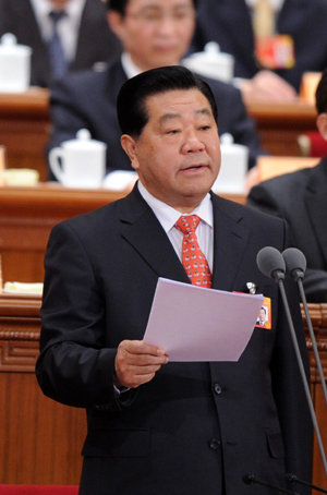 Jia Qinglin, chairman of the 11th National Committee of the Chinese People's Political Consultative Conference (CPPCC), presides over the closing ceremony of the Third Session of the 11th CPPCC National Committee at the Great Hall of the People in Beijing, capital of China, March 13, 2010.