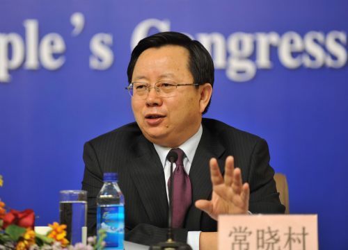 Chang Xiaocun, director of market system development department with the Ministry of Commerce (MOFCOM), speaks during a press conference on 'Activating Circulation and Promoting consumption' held on the sidelines of the Third Session of the 11th National People's Congress in Beijing, China, March 13, 2010.