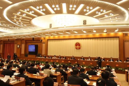 The presidium of the Third Session of the 11th National People's Congress (NPC) gather for their fourth meeting at the Great Hall of the People in Beijing, capital of China, March 13, 2010. 
