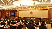 The presidium of the Third Session of the 11th National People's Congress (NPC) gather for their fourth meeting at the Great Hall of the People in Beijing, capital of China, March 13, 2010.