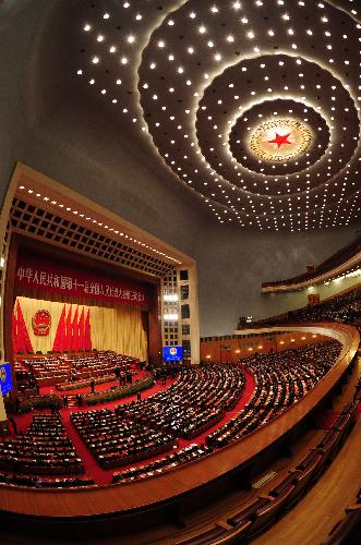 The Third Session of the 11th National People's Congress holds its closing meeting at the Great Hall of the People in Beijing, China, March 14, 2010.