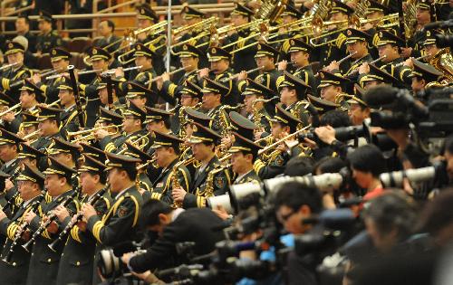 The military band plays during the closing meeting of the Third Session of the 11th National People's Congress at the Great Hall of the People in Beijing, China, March 14, 2010.