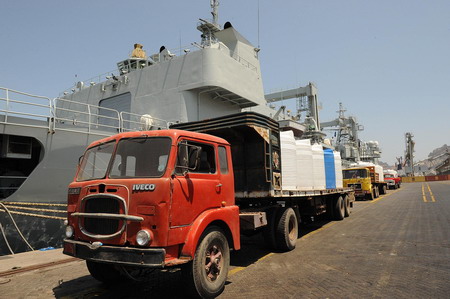 Trucks line up to meet the Chinese navy supply ship Qiandaohu at the Gulf of Aden near Yemen on March 14, 2010. 