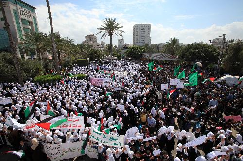 Palestinians attend a rally against Israel's consecration of a synagogue in Jerusalem's Old City, in Gaza City on March 16, 2010.