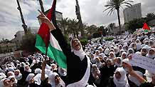 Palestinian school-girls chant slogans during a rally against Israel's consecration of a synagogue in Jerusalem's Old City, in Gaza City on March 16, 2010.