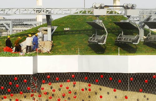Photo taken on March 28, 2010 shows the sightseeing cable telpher and the roof lawn inside the Switzerland Pavilion of the 2010 Shanghai World Expo, which is open to public visitors, in the World Expo Site at Shanghai, east China.