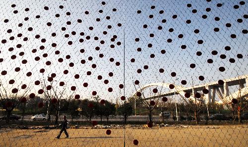 Photo taken on March 28, 2010 shows the purdah fence of the Switzerland Pavilion of the 2010 Shanghai World Expo, which is open to public visitors, in the World Expo Site at Shanghai, east China.