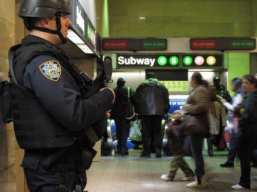 A police officer of the New York Police Department (NYPD) stands guard at the Grand Central Station in New York, the United States, March 29, 2010. 