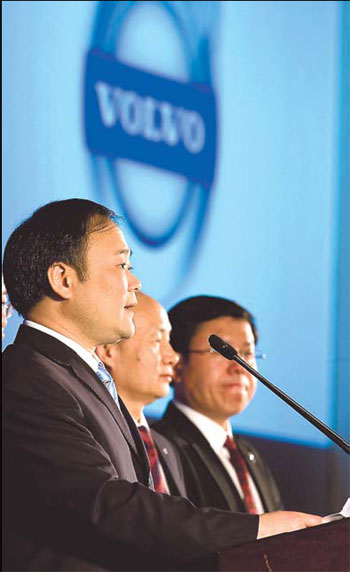Geely chairman Li Shufu answers questions at the Volvo takeover ceremony in Beijing on Tuesday.