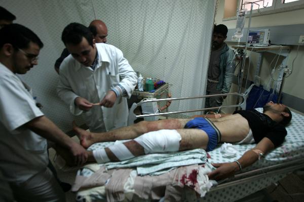 An injured Palestinian receives medical treatment at a hospital in the Gaza Strip town of Khan-Yunis on March 30, 2010. 