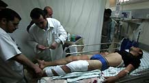 An injured Palestinian receives medical treatment at a hospital in the Gaza Strip town of Khan-Yunis on March 30, 2010.