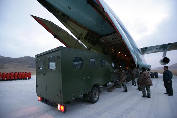 Aviation supporting equipment from Chengdu, capital of southwest China's Sichuan Province, arrives at the airport of quake-hit Yushu, northwest China's Qinghai Province, April 14, 2010, to ensure planes' safe landing. 