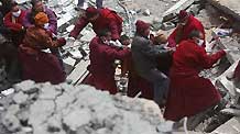Rescuers work in a sustaining operation of searching for survivors among debris in quake-hit Yushu County, northwest China's Qinghai Province, April 16, 2010.