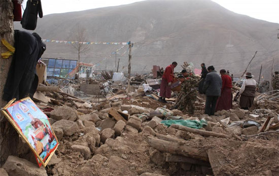 Rescuers search for victims in the ruins of a 7.1-magnitude earthquake hit Yushu Tibetan Autonomous Prefecture in Qinghai province early on Wednesday.